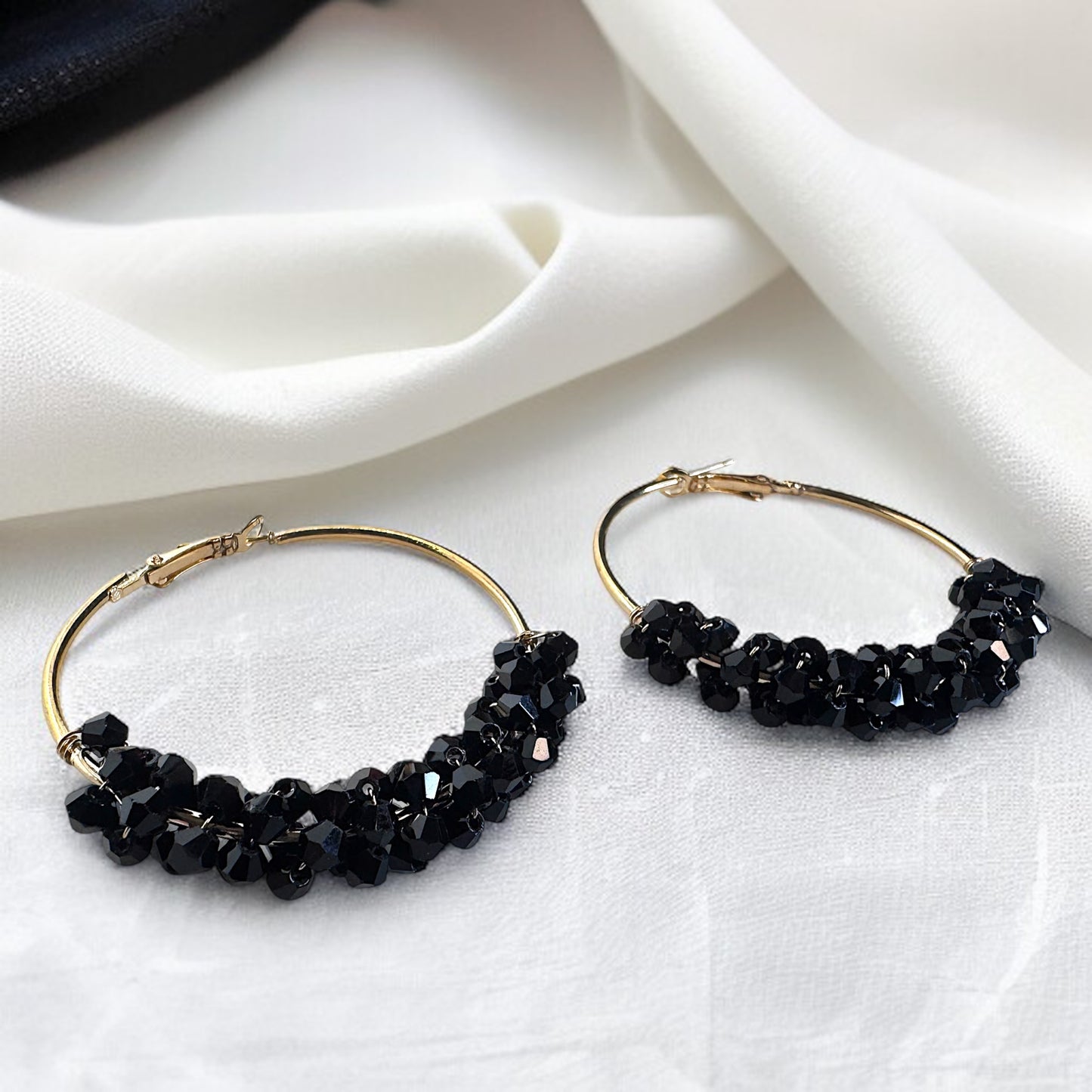 Chic Elegance: Black & Gold Beaded Hoop Earrings