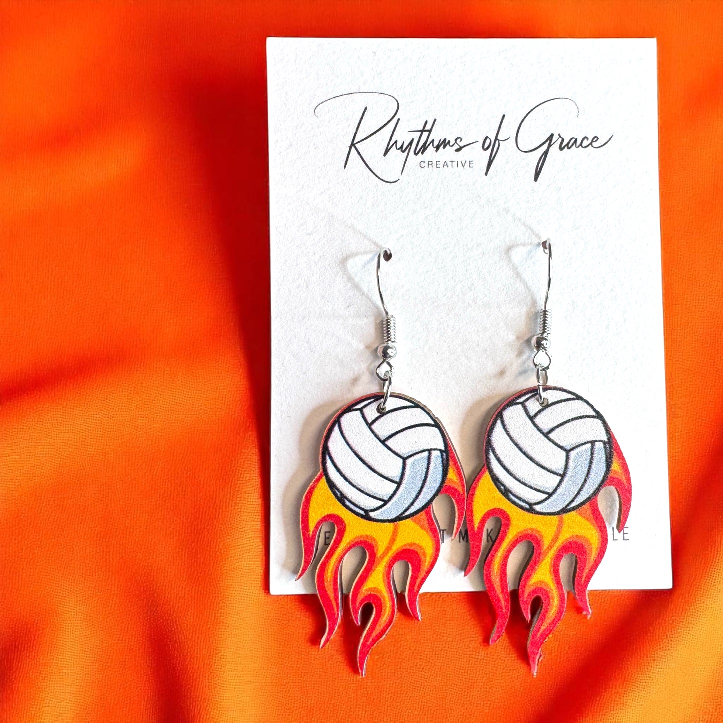 Score Big Style with Flaming Volleyball Dangle Earrings!