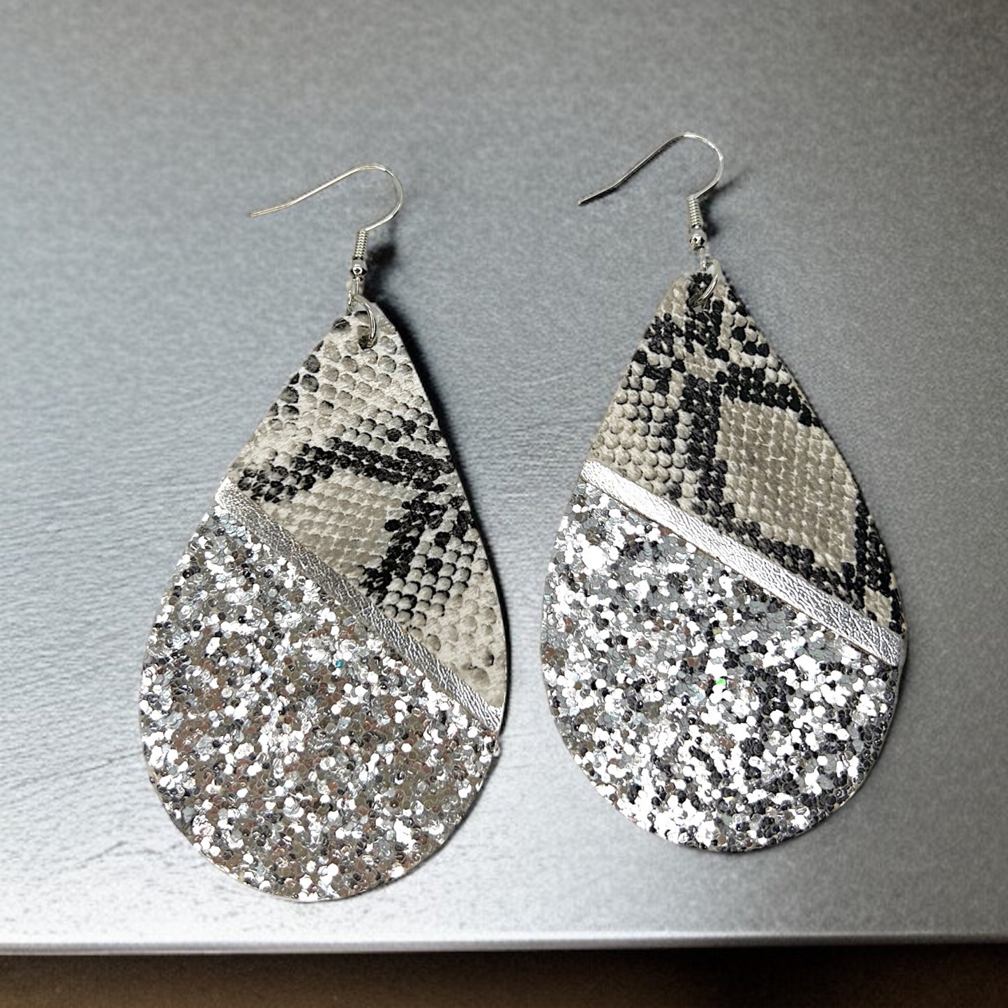 Slither in Style with Our Snake Print Teardrop Dangle Earrings! 🐍