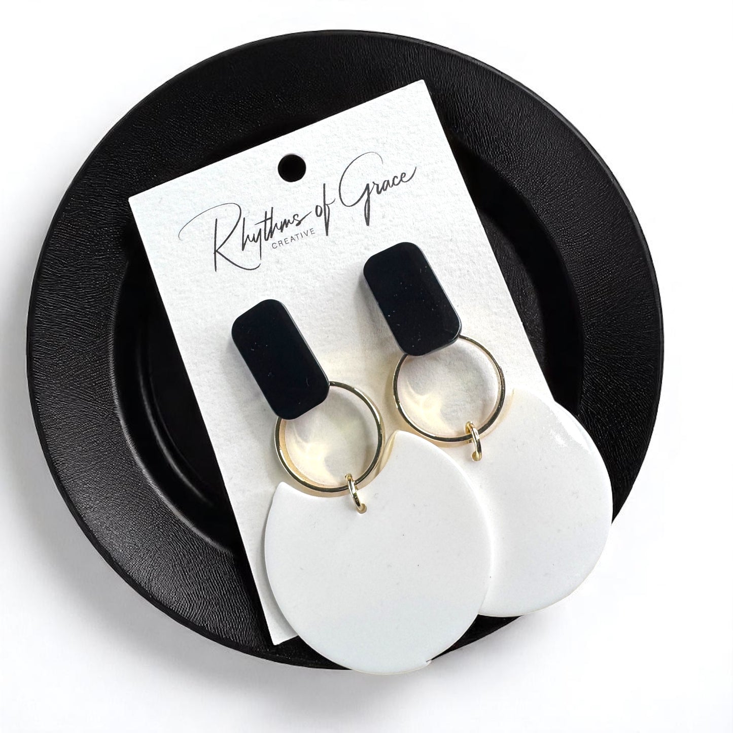 Chic & Cheerful: Black & White Dangle Earrings