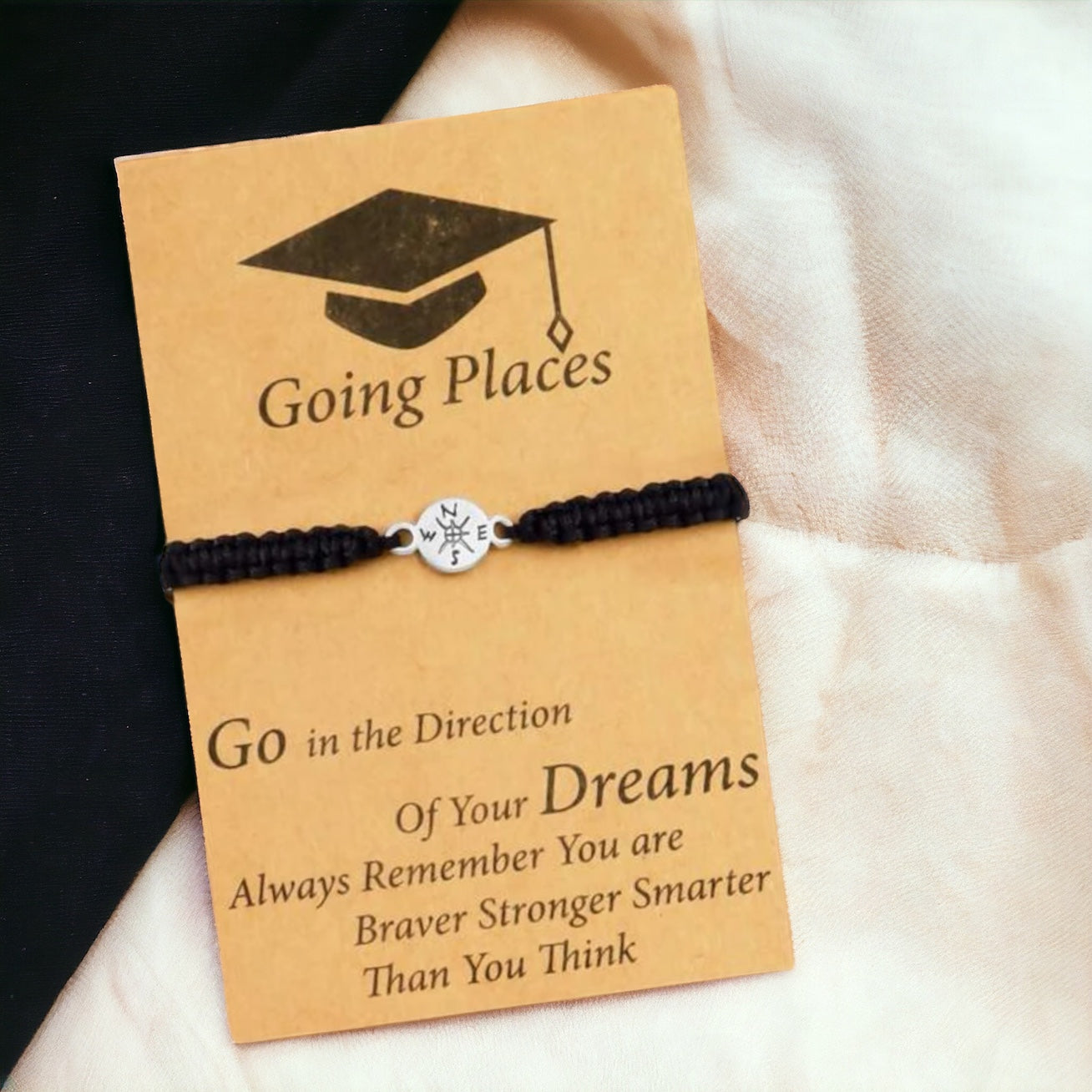 A graduation-themed bracelet with a wish card that reads 'Going Places' and 'Go in the Direction Of Your Dreams Always Remember You Are Braver Stronger Smarter Than You Think'.
