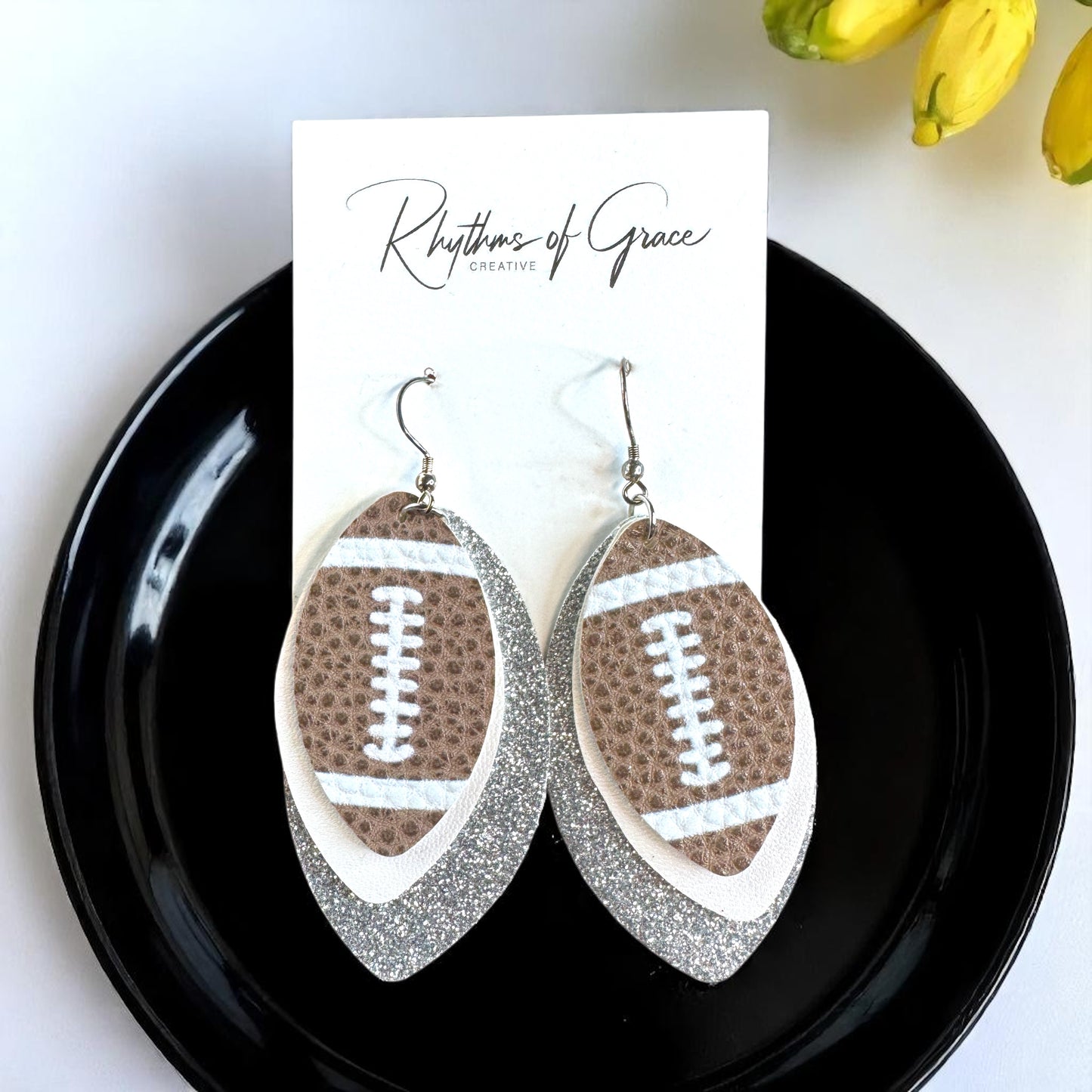 Game Day Glam: Silver and White Football Earrings for the Ultimate Fan!