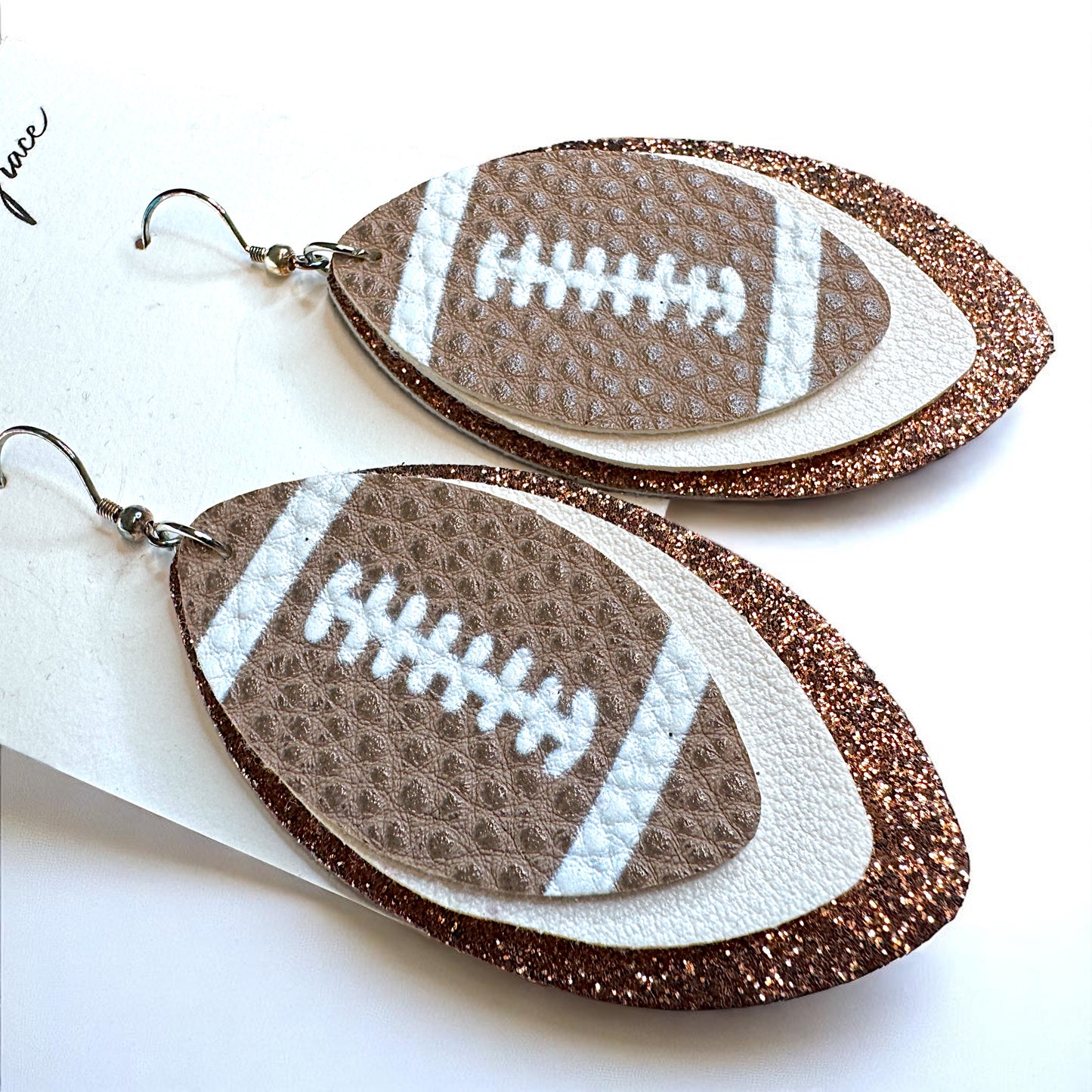 Game Day Glam: Brown and White Football Earrings for the Ultimate Fan!