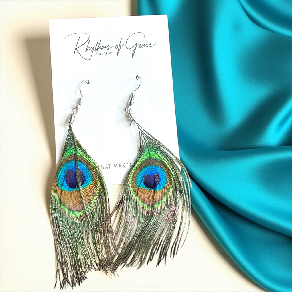 Elevate Your Style with Our Peacock Feather Dangle Earrings!