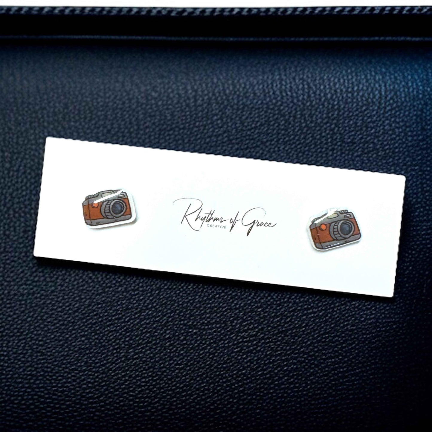 Snap Stylish: Camera Stud Earrings for Every Shutterbug!