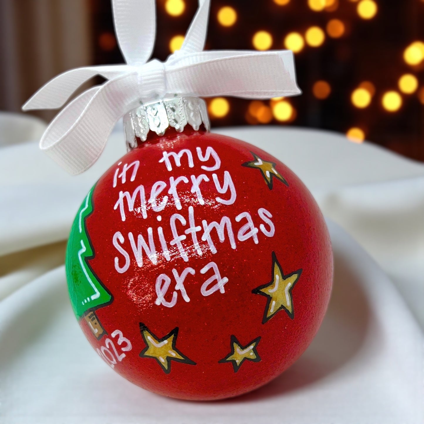 Celebrate the Eras: Exclusive Merry Swiftmas Ornament!