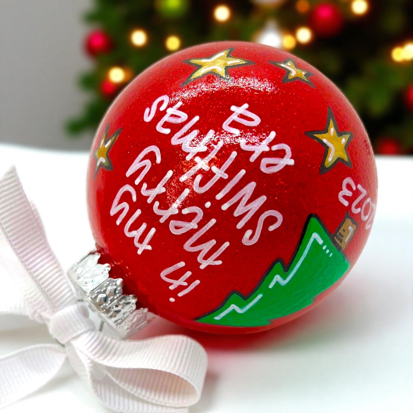 Celebrate the Eras: Exclusive Merry Swiftmas Ornament!