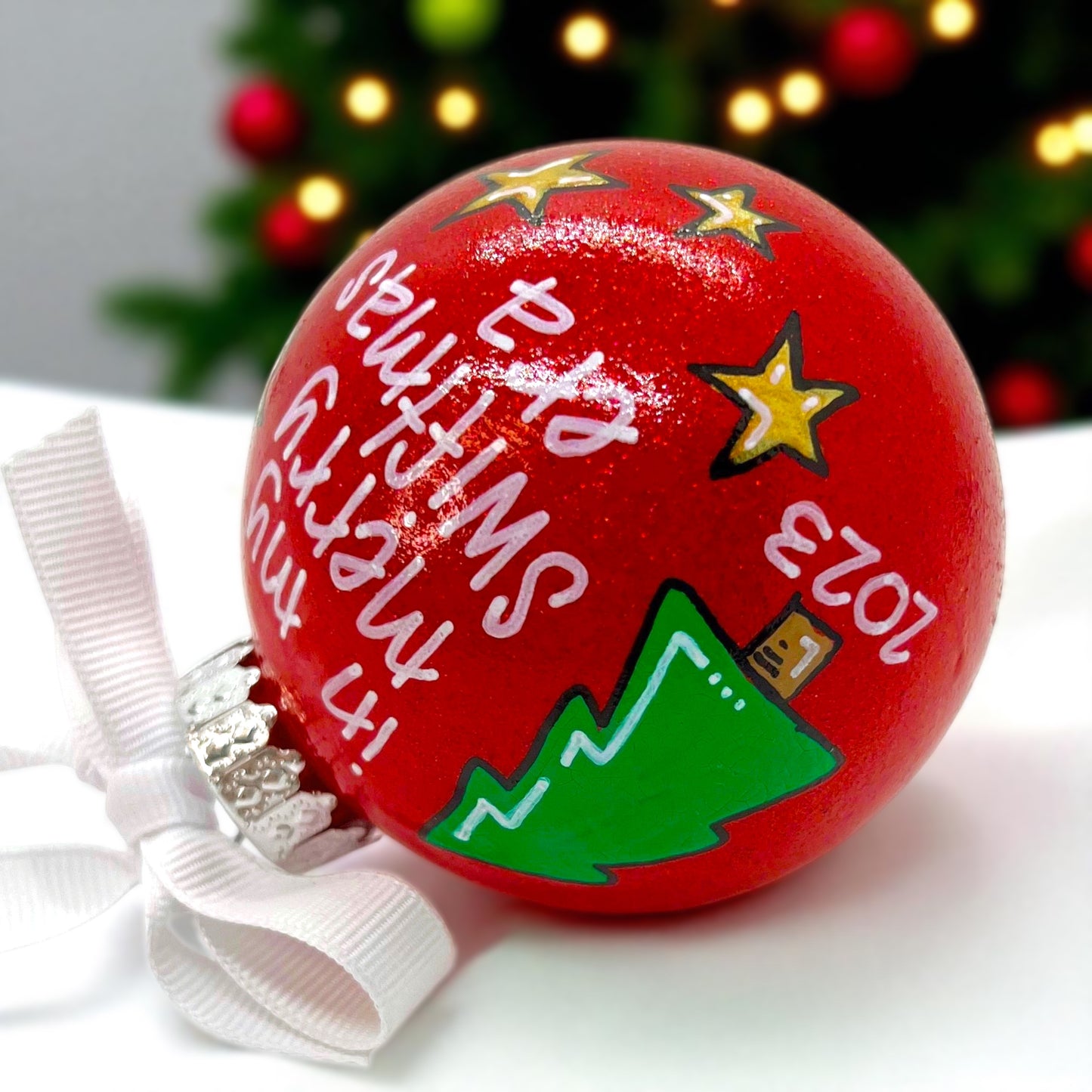 Celebrate the Eras: Exclusive Merry Swiftmas Ornament!