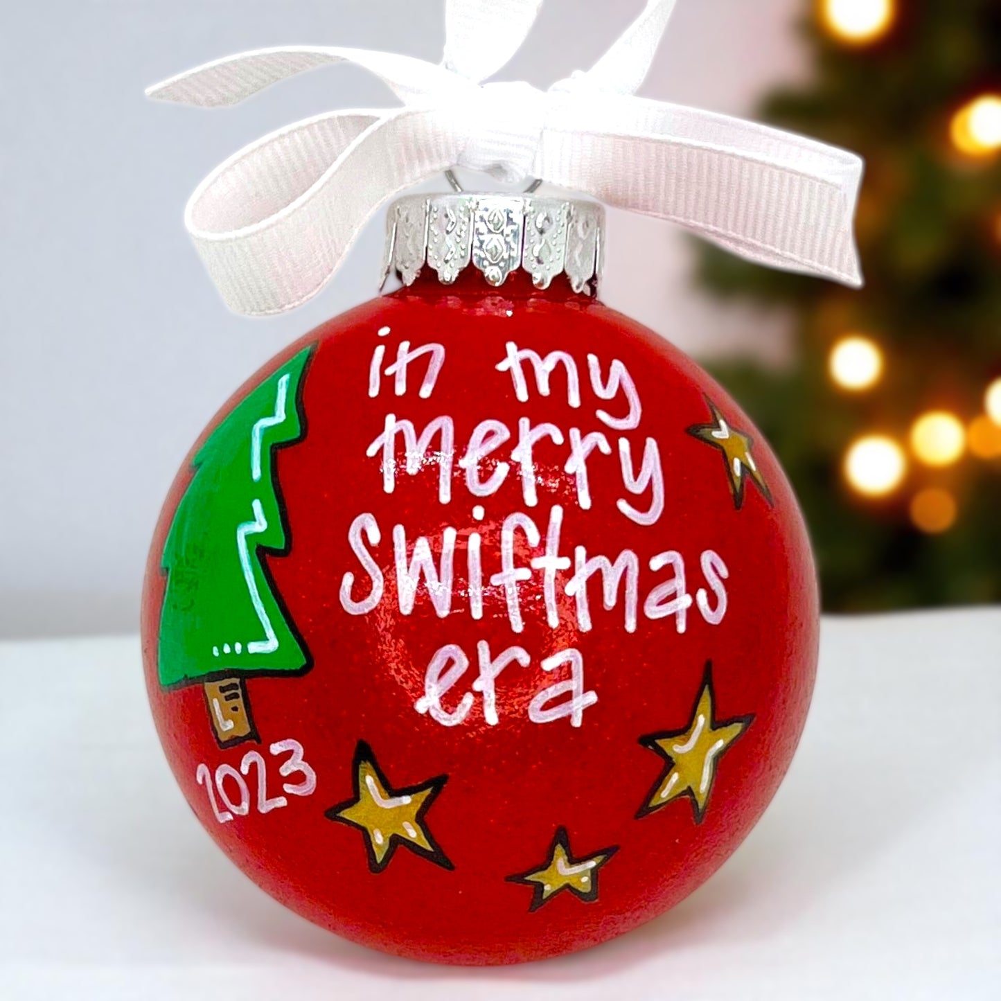 Celebrate the Eras: Exclusive Merry Swiftmas Ornament!
