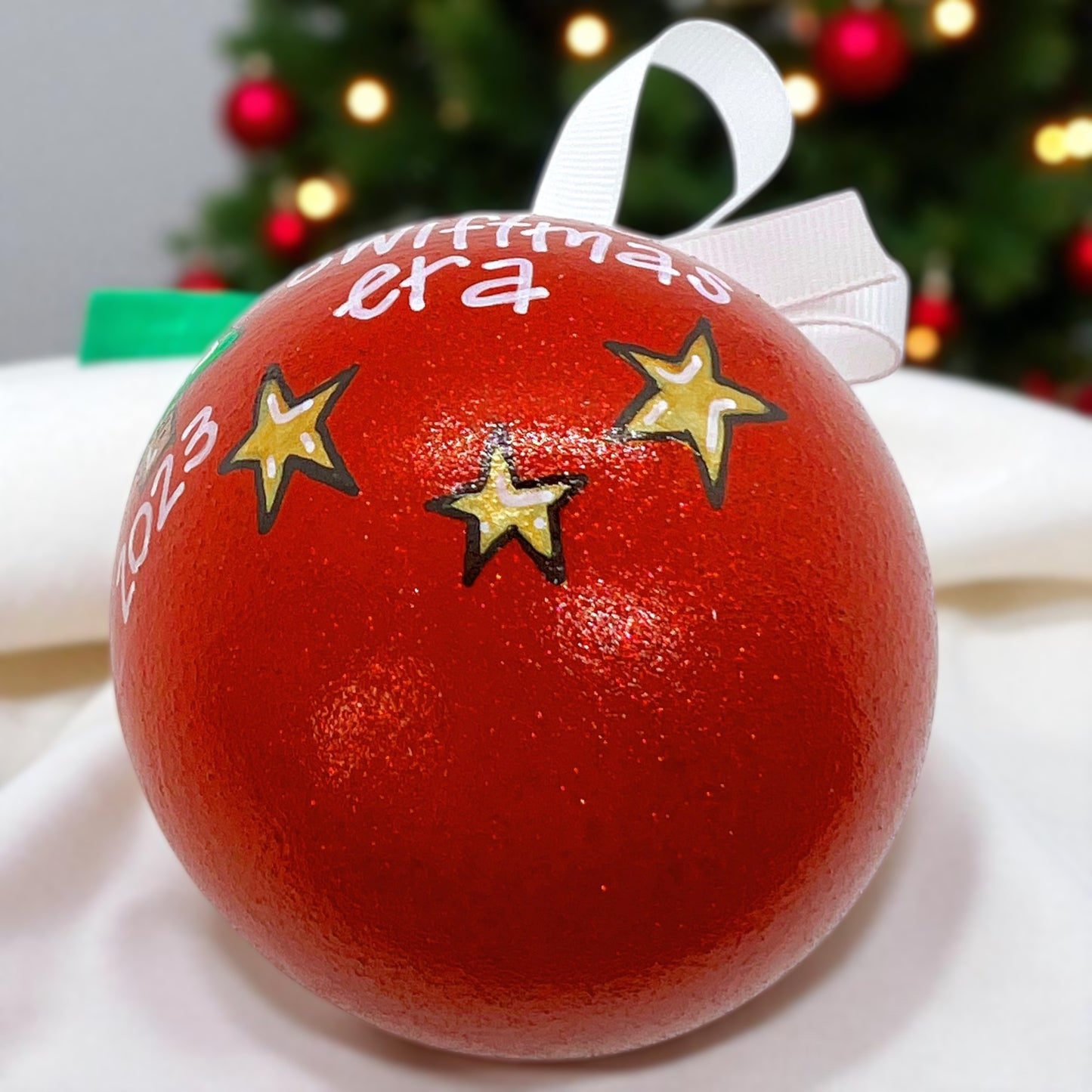 Celebrate the Eras: Exclusive Merry Swiftmas Ornament!