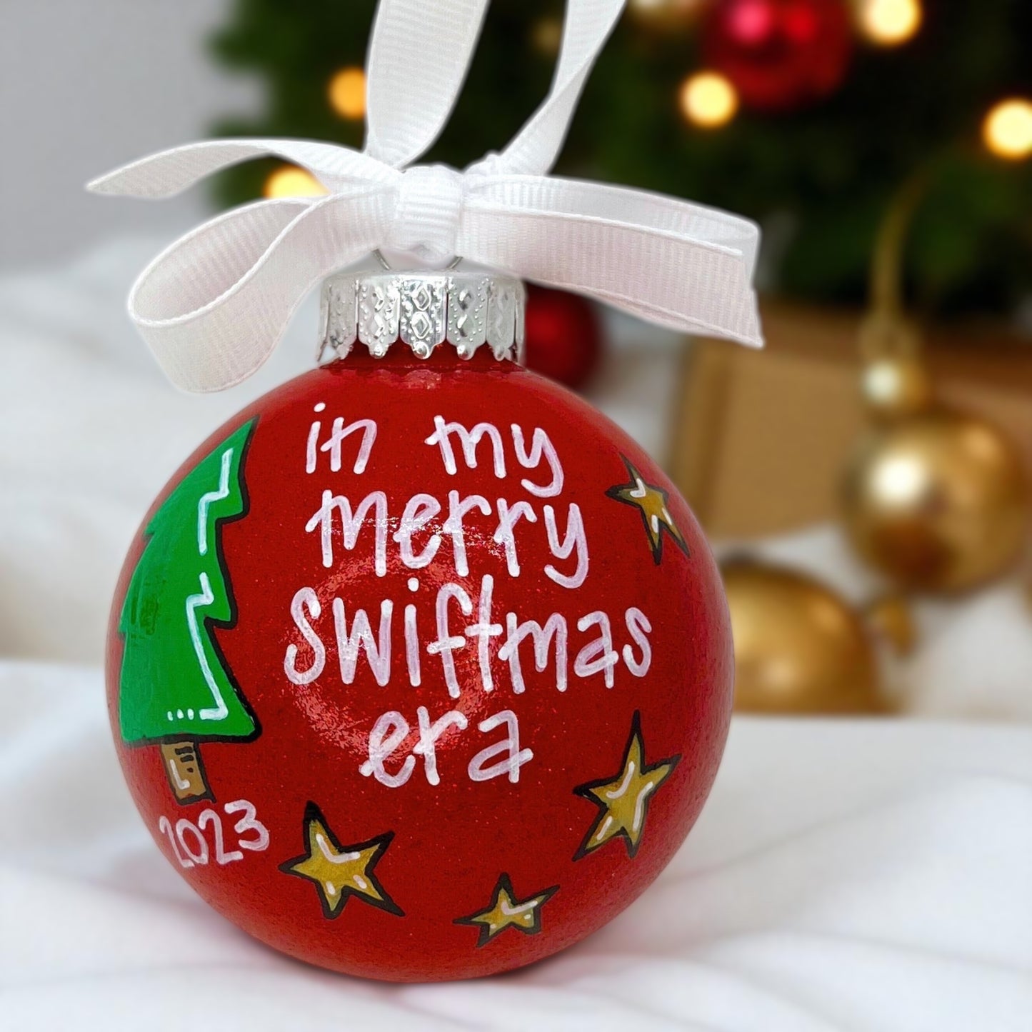 Celebrate the Eras: Exclusive Merry Swiftmas Ornament!