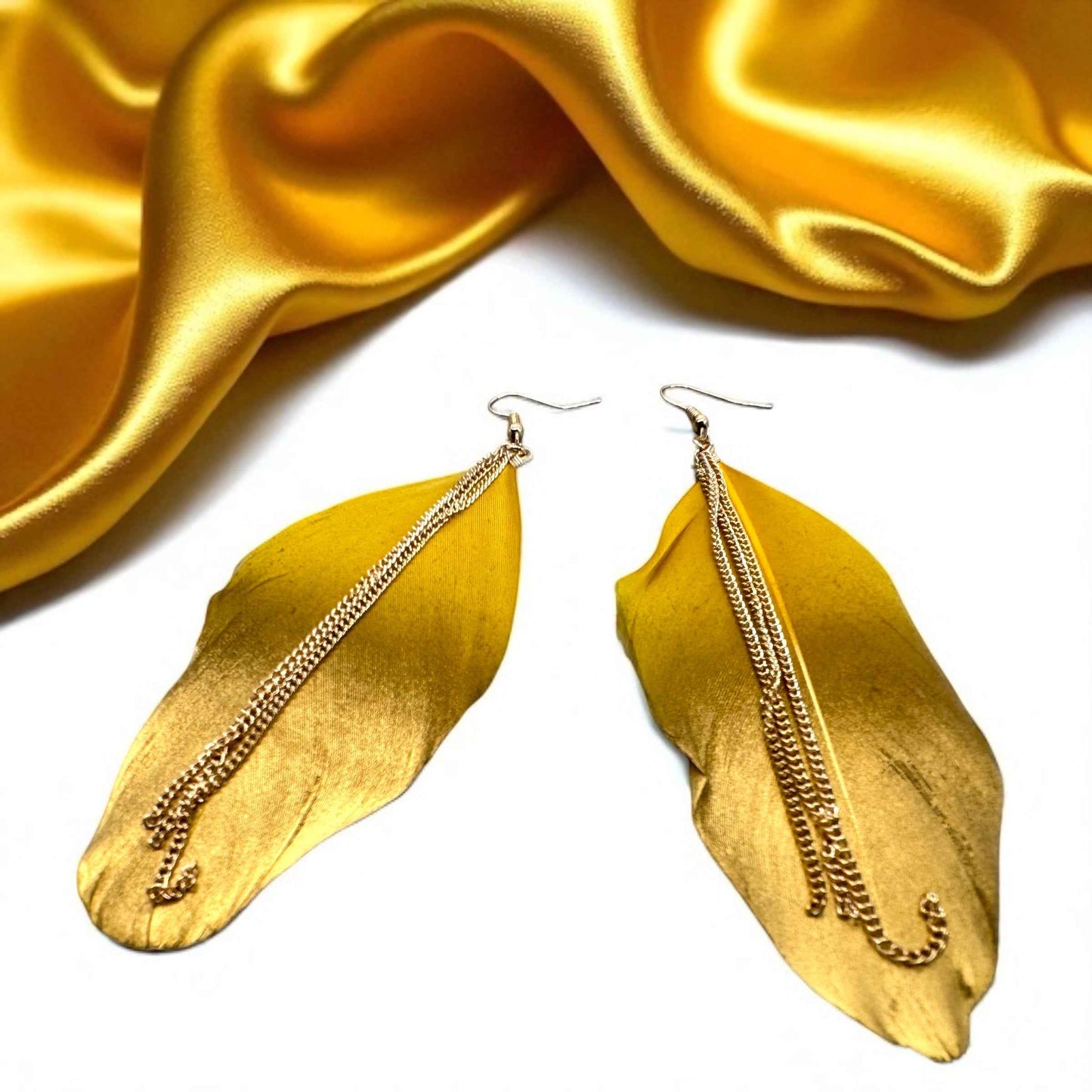 Gold Dipped Feather Earrings: Dance Into the Festivity!