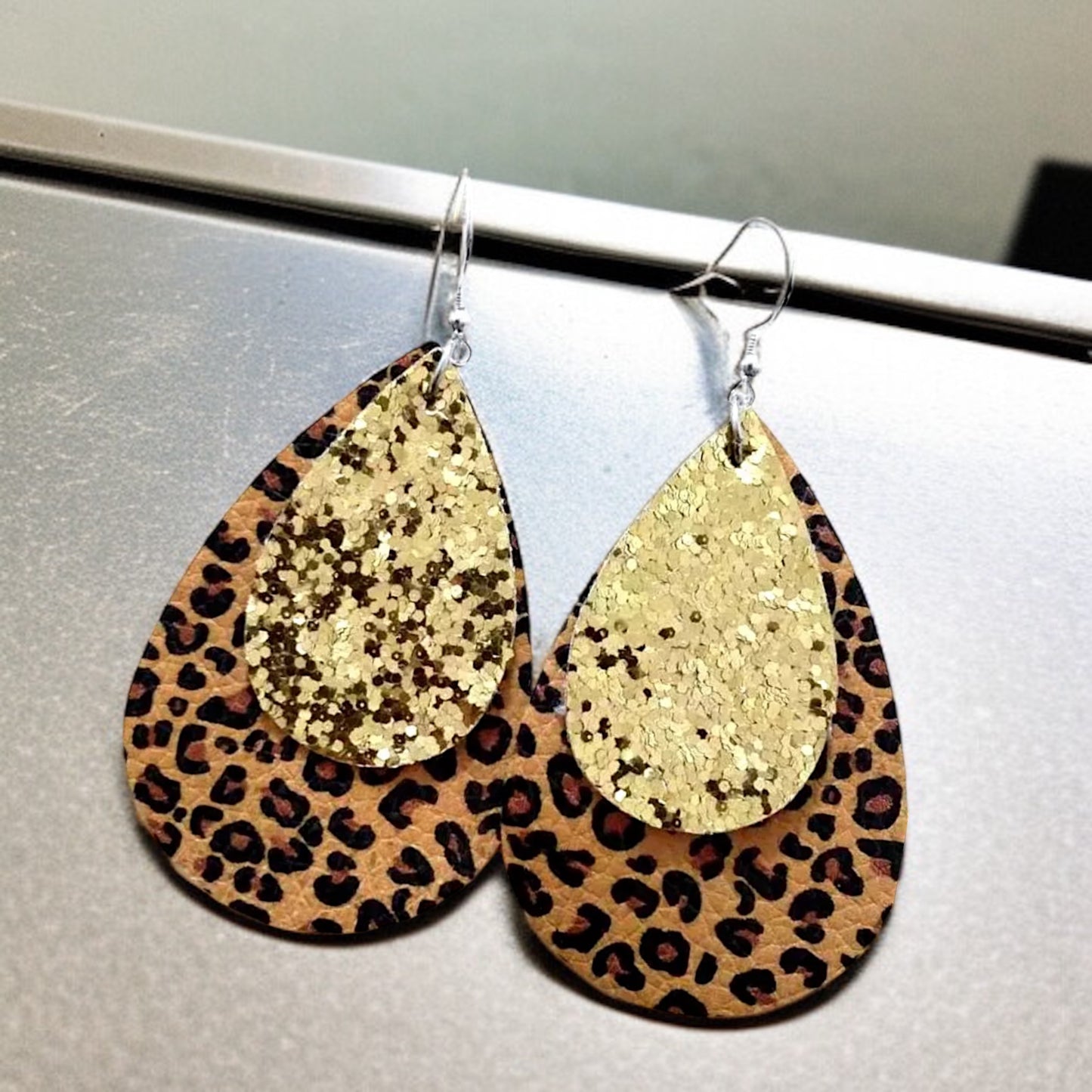 Unleash Your Inner Diva: Cheetah Print & Glitter Teardrop Earrings!