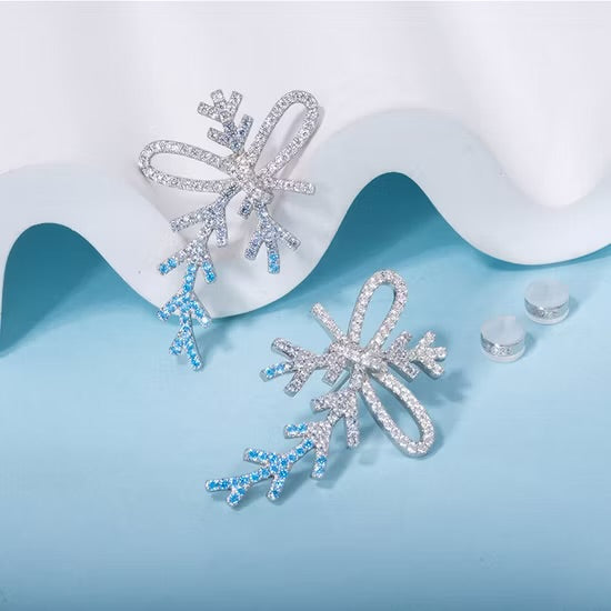Sparkling Frozen Bow Earrings – Embrace Holiday Glamour!