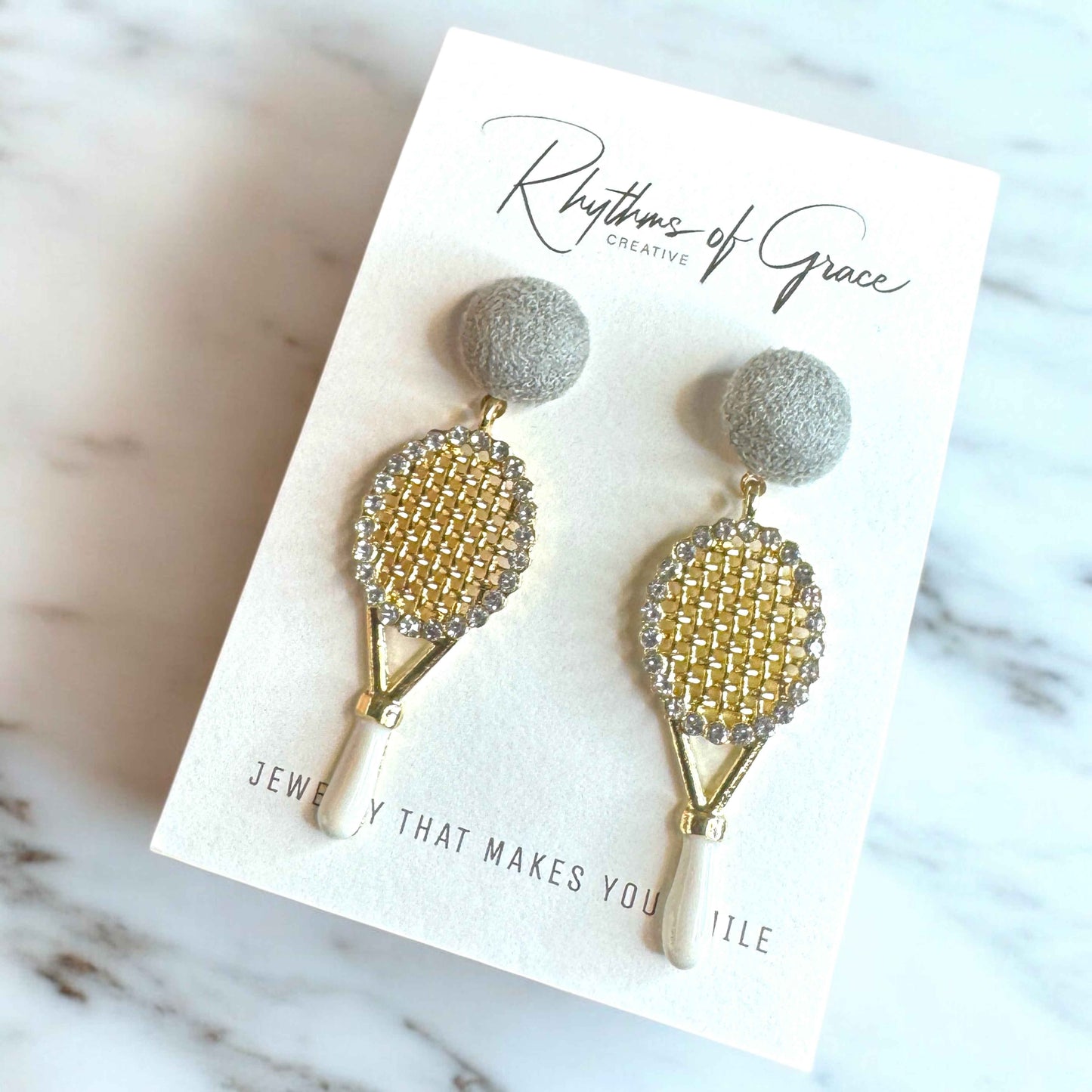 Sparkle on the Court with Our Rhinestone Tennis Racket Dangle Earrings! 🎾