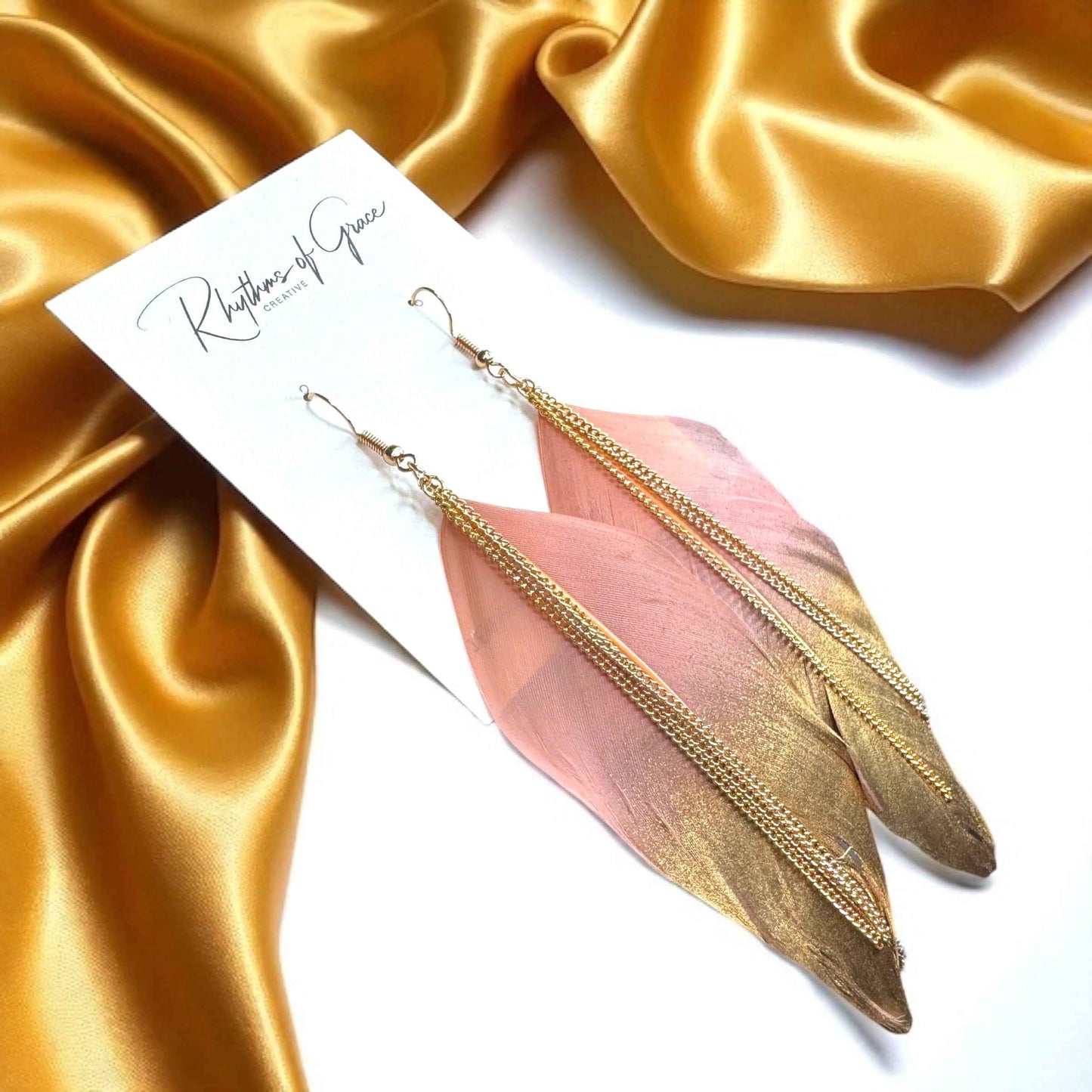 Gold Dipped Feather Earrings: Dance Into the Festivity!