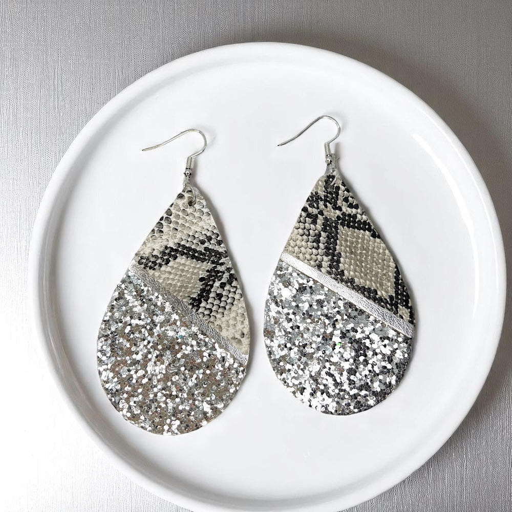 Slither in Style with Our Snake Print Teardrop Dangle Earrings! 🐍