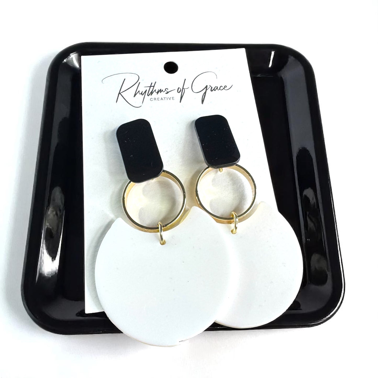 Chic & Cheerful: Black & White Dangle Earrings