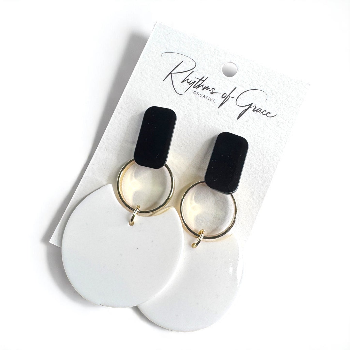 Chic & Cheerful: Black & White Dangle Earrings