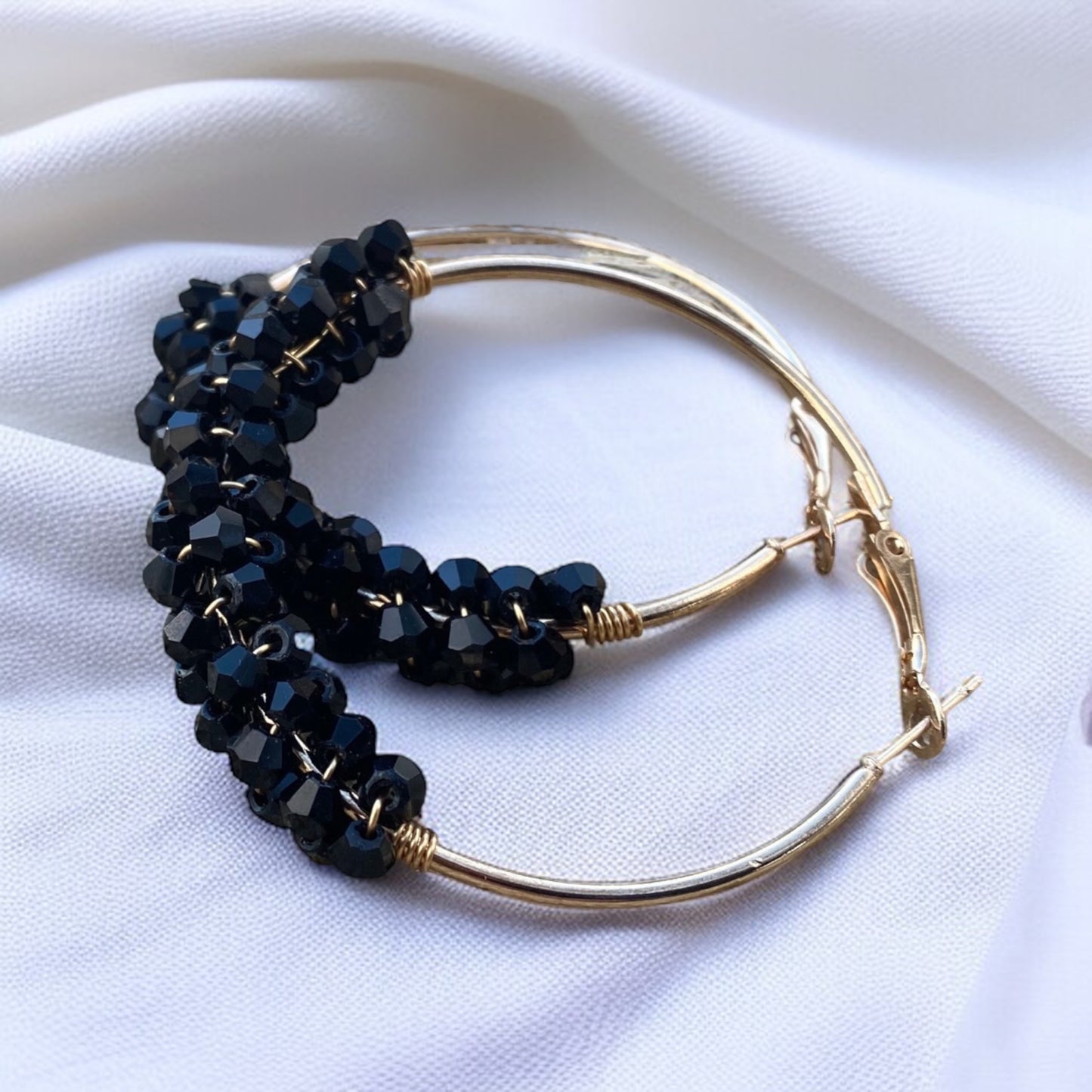 Chic Elegance: Black & Gold Beaded Hoop Earrings