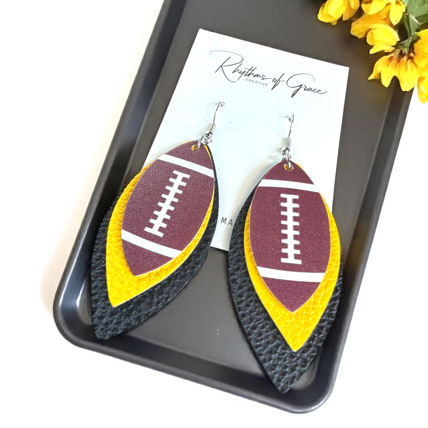 Chic Fan Flair: Black and Gold Football Earrings Perfect for Game Day Glam!