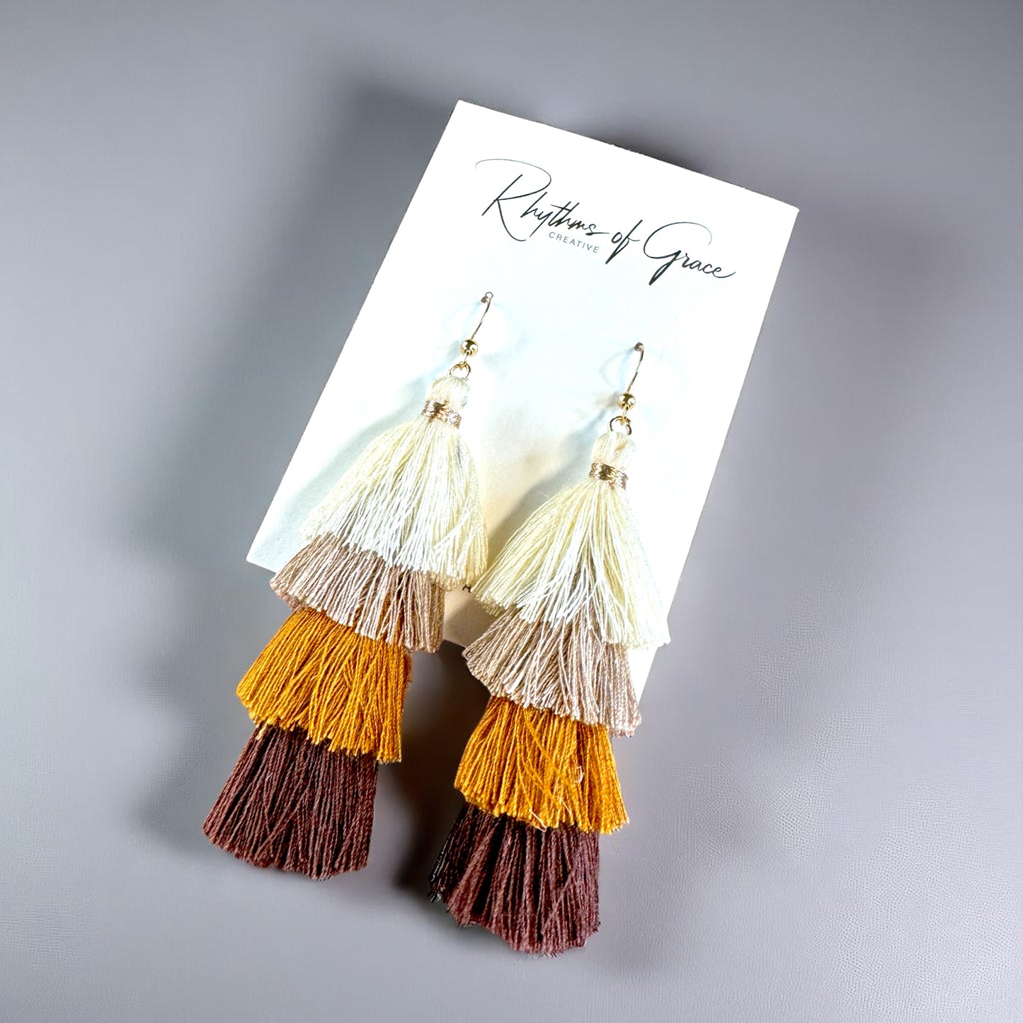 Boho Babe Alert! Tiered Tassel Earrings - Neutral Chic