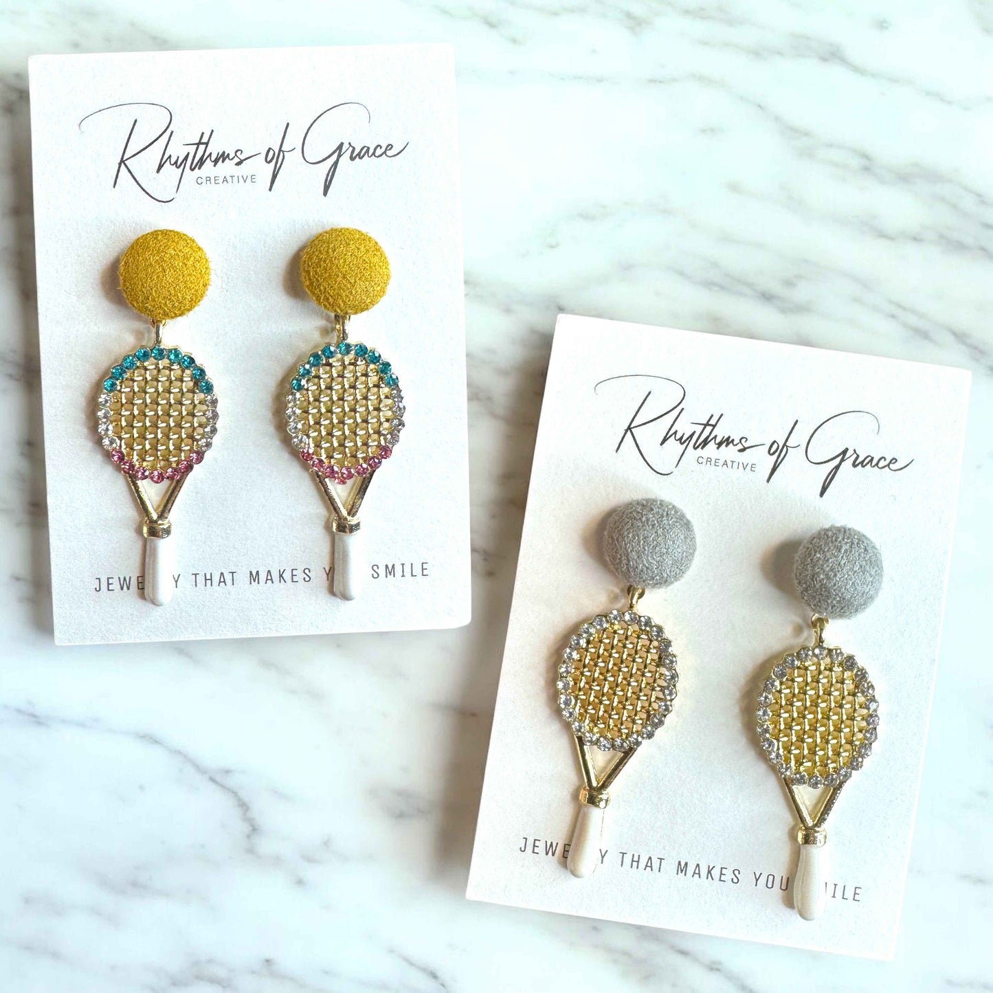 Sparkle on the Court with Our Rhinestone Tennis Racket Dangle Earrings! 🎾