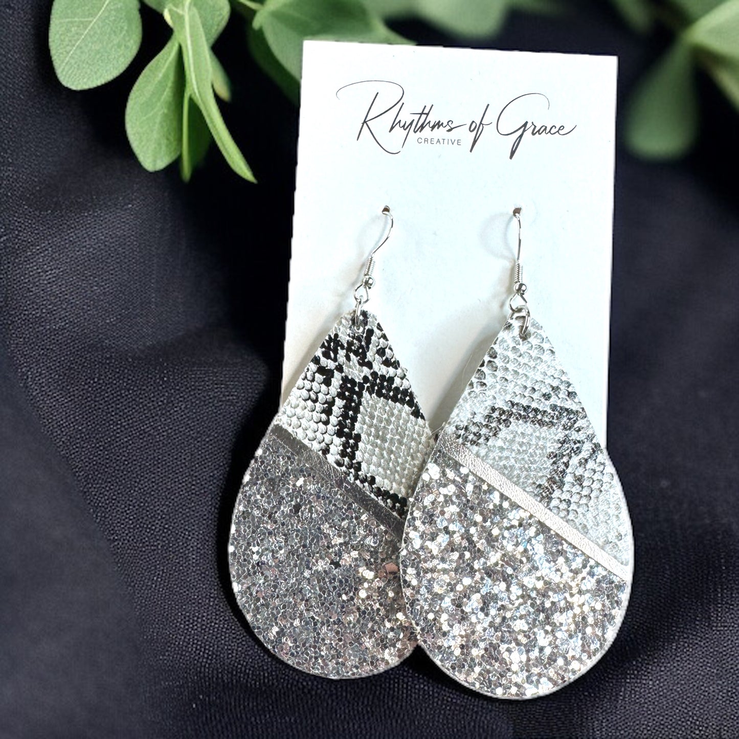Slither in Style with Our Snake Print Teardrop Dangle Earrings! 🐍