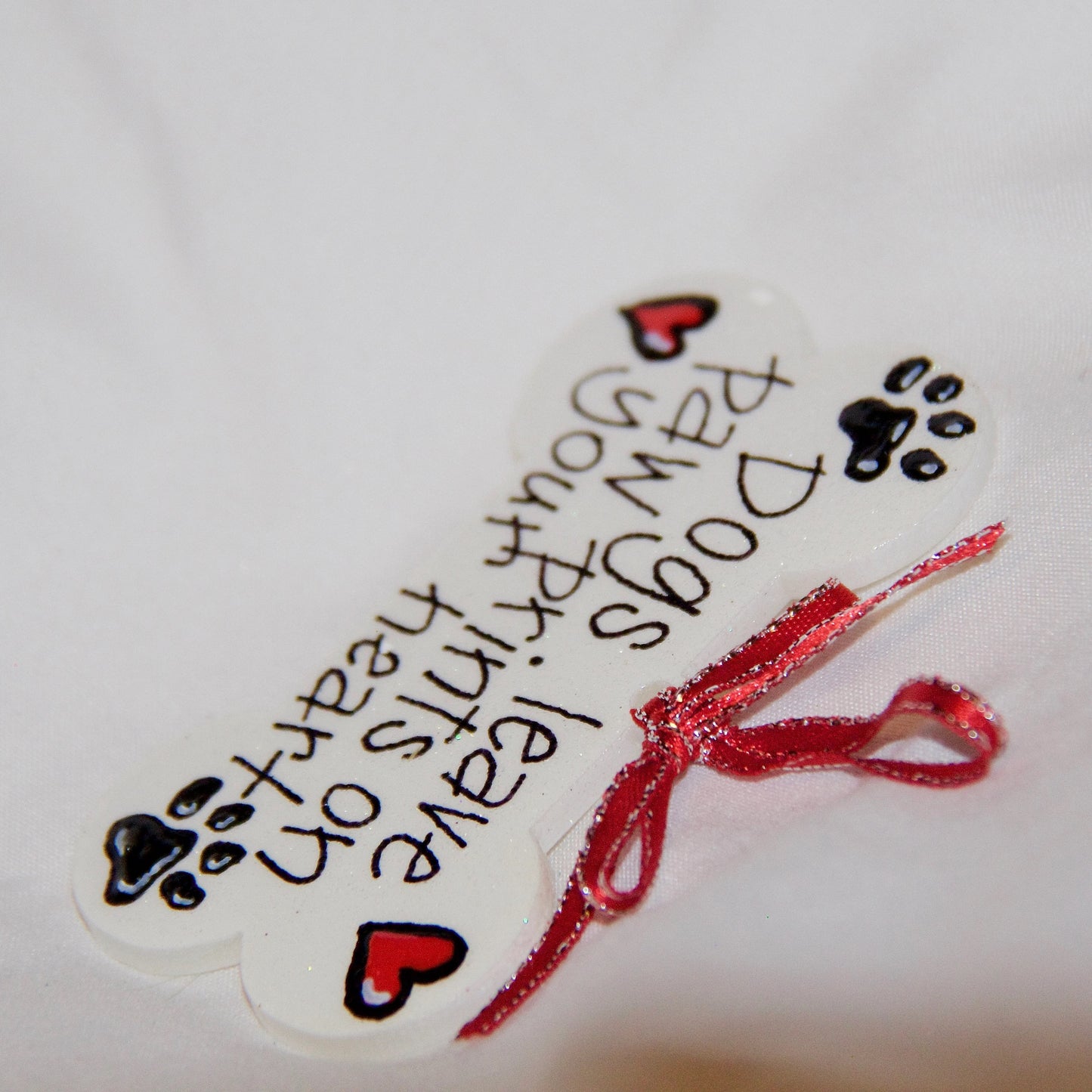 Paw Prints on Your Heart - Personalized Dog Bone Ornament for Pet Lovers!
