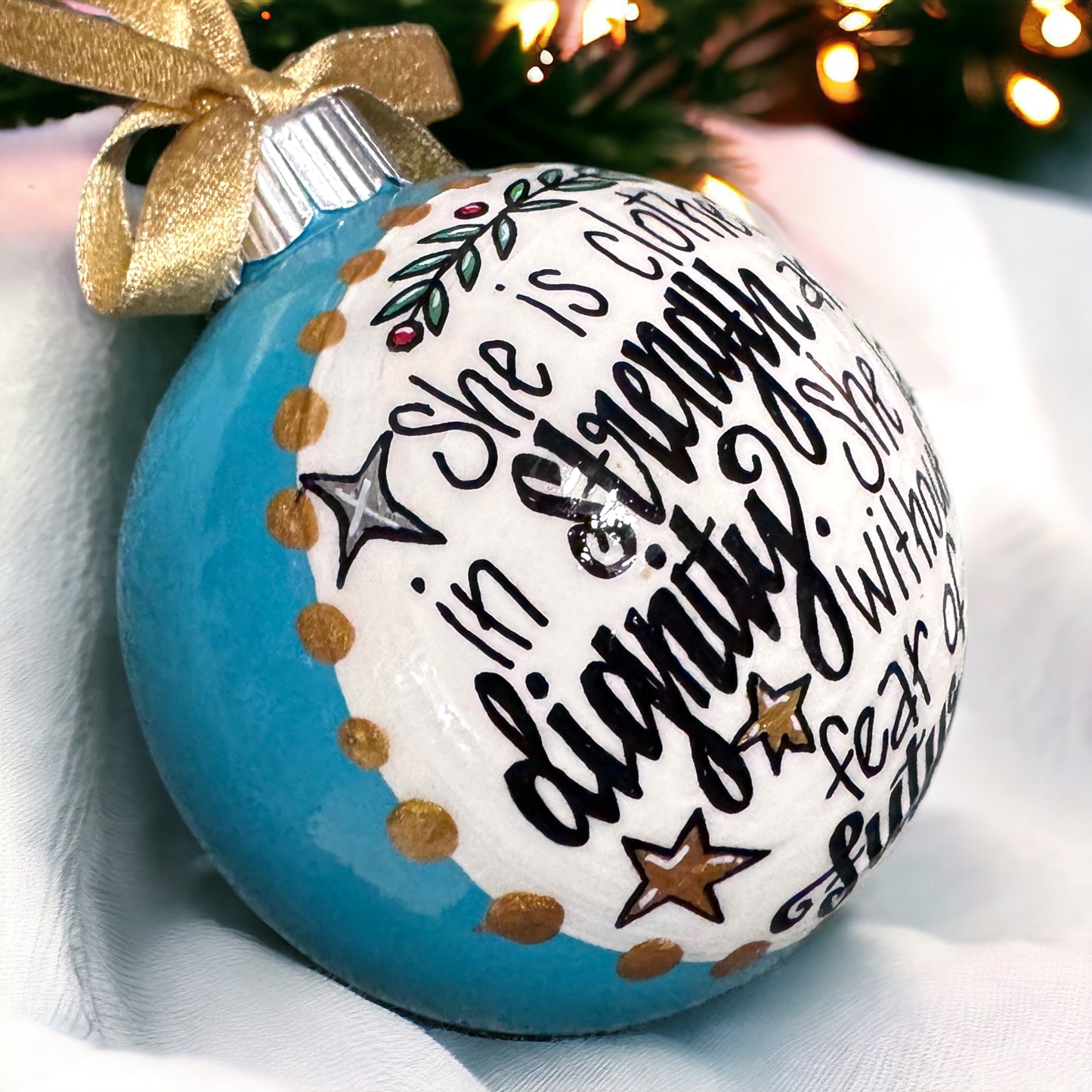 Christmas Ornament: “She is clothed in strength and dignity. She laughs without fear of the future.”