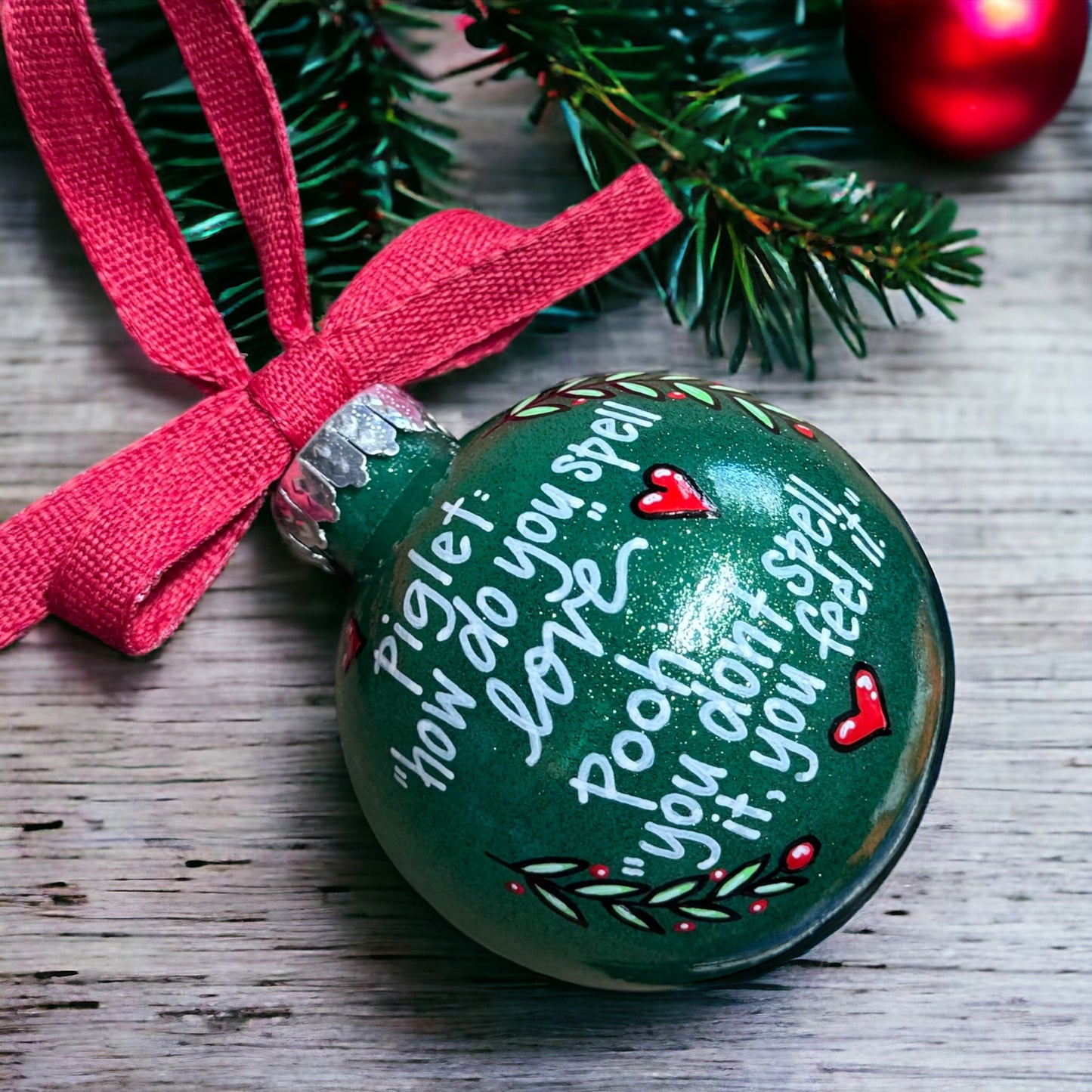 Christmas Ornament: "Piglet: How do you spell love? Pooh: You don't spell it, you feel it."