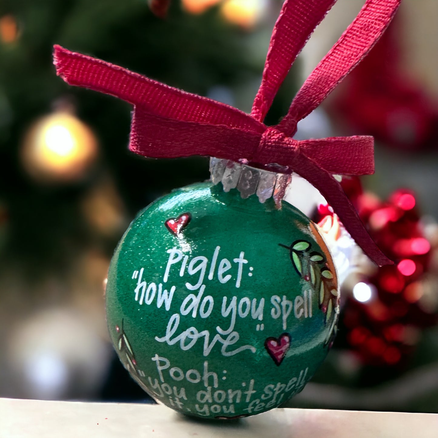 Christmas Ornament: "Piglet: How do you spell love? Pooh: You don't spell it, you feel it."
