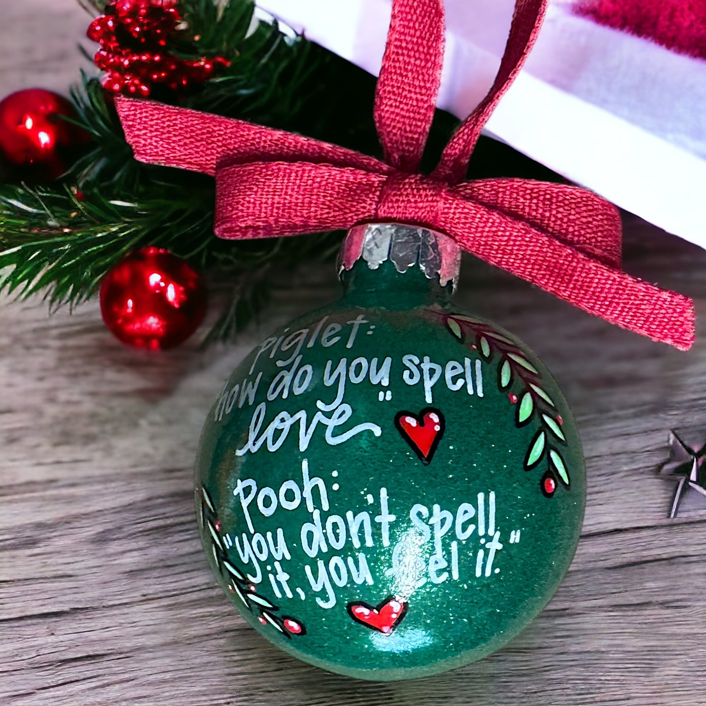 Christmas Ornament: "Piglet: How do you spell love? Pooh: You don't spell it, you feel it."