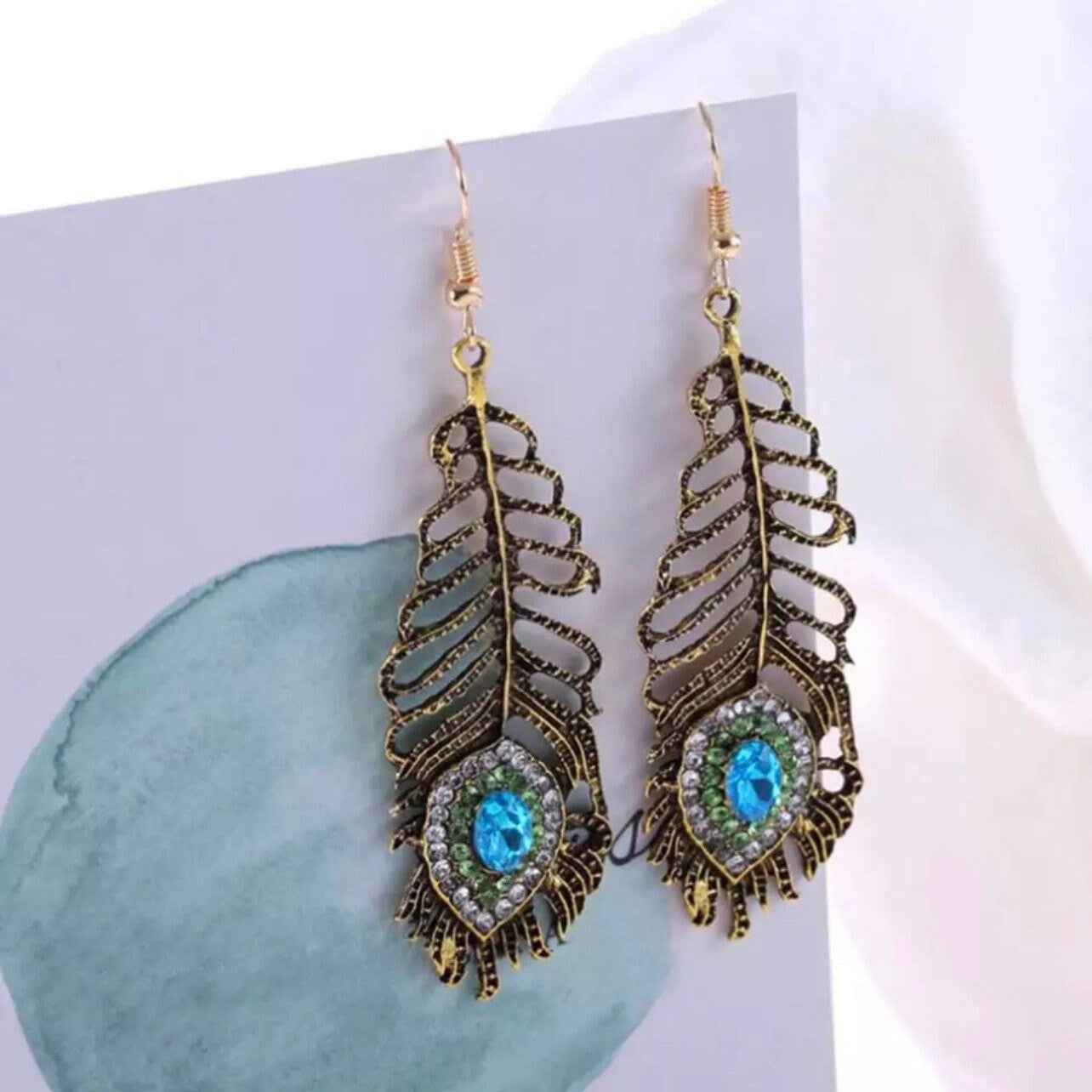 Feathered Sparkle: Stunning Peacock Dangle Earrings – Flutter into Style!