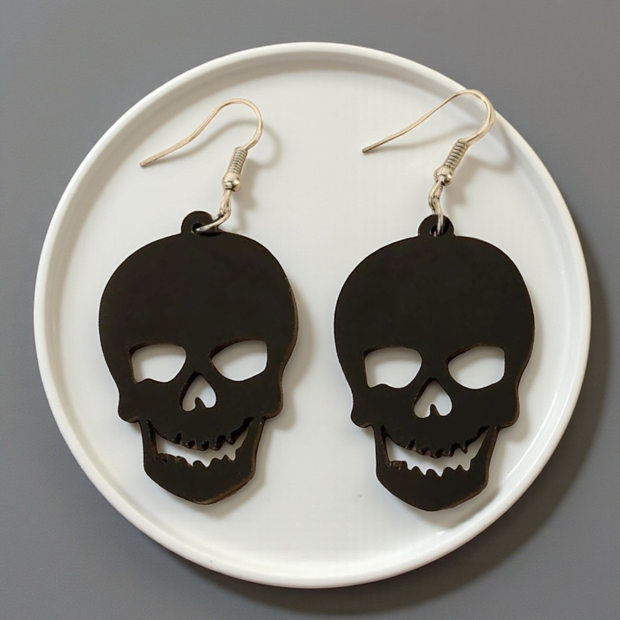 Spooky Chic: Black Skull Dangle Earrings for the Bold at Heart!