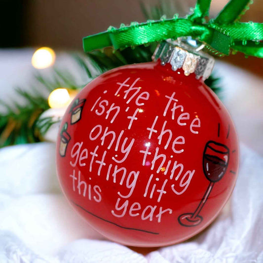 Christmas Ornament: "The tree isn't the only thing getting lit this year."