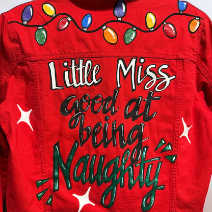 Hand Painted Jean Jacket: “Little Miss Good At Being Naughty”