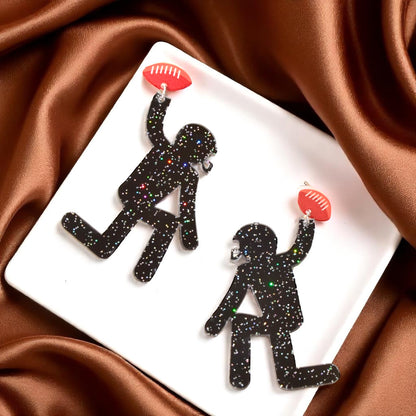 Touchdown Style: Football Player Dangle Earrings 🏈
