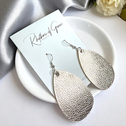 Sparkle & Shine: Metallic Teardrop Faux Leather Earrings! 🌟