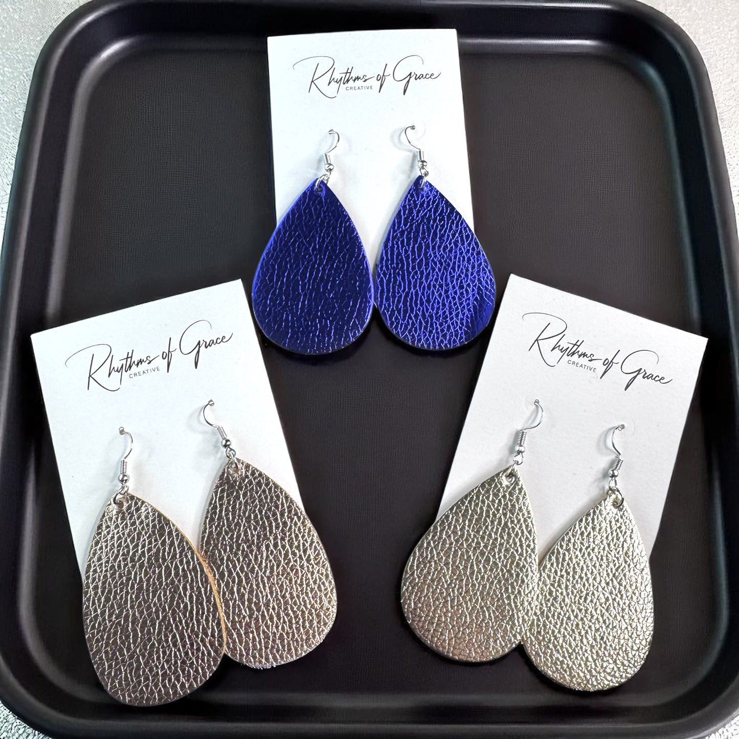 Sparkle & Shine: Metallic Teardrop Faux Leather Earrings! 🌟