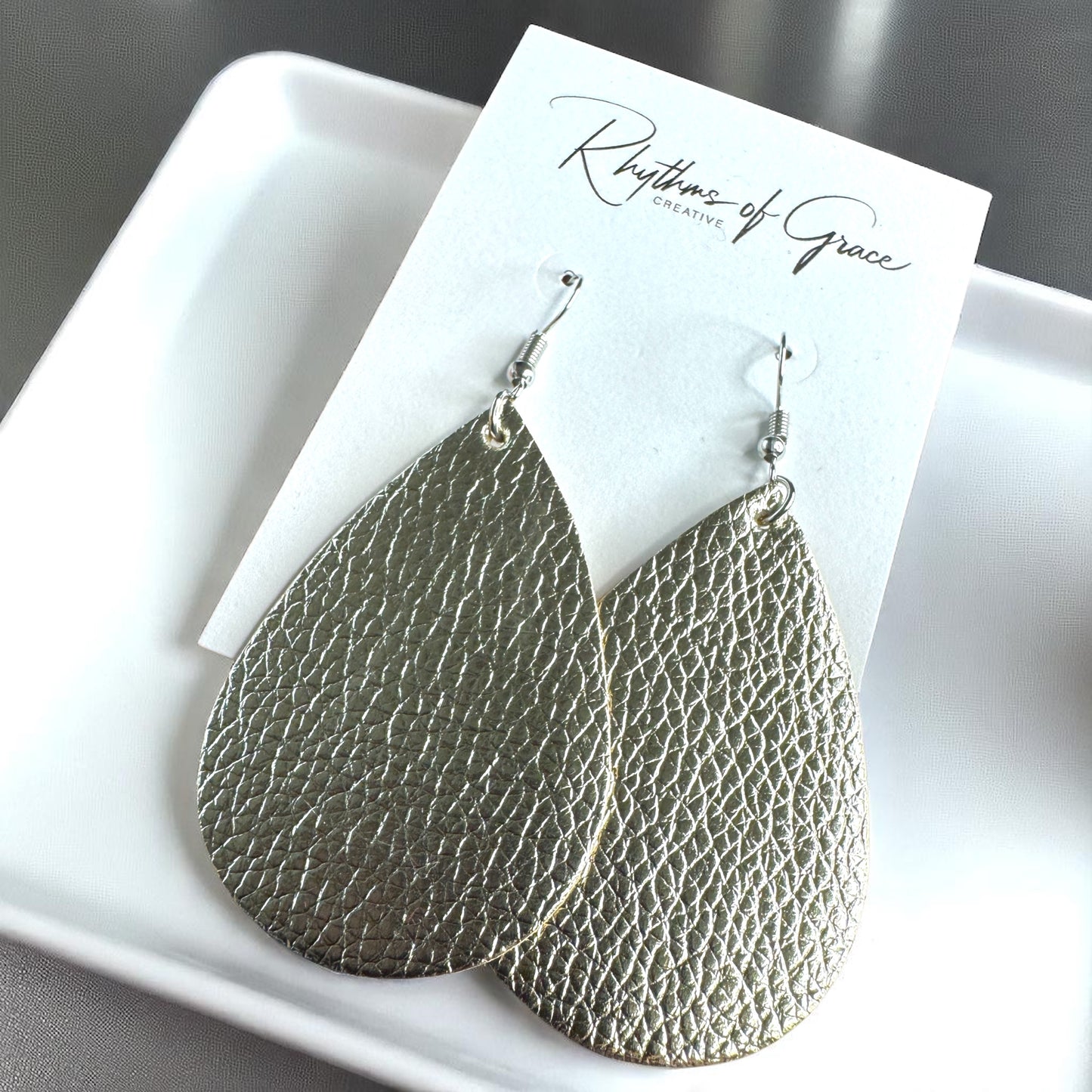 Sparkle & Shine: Metallic Teardrop Faux Leather Earrings! 🌟