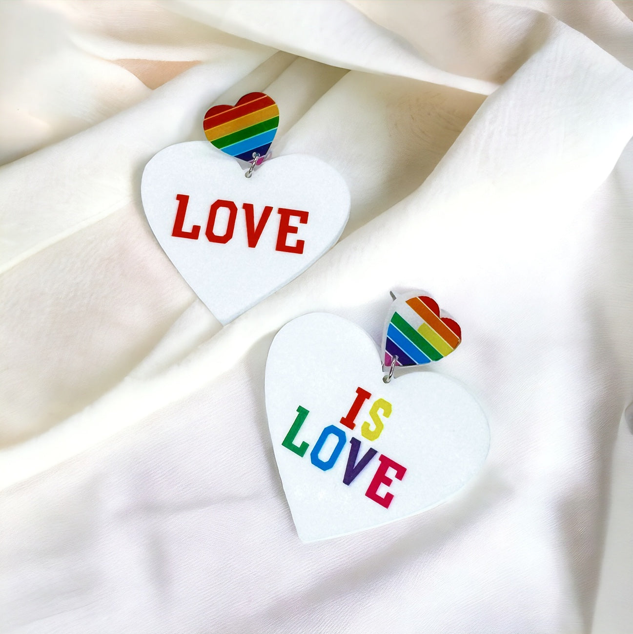 Heartfelt Sparkle: Love is Love Earrings – Rainbow Bling for Your Pride and Vibe!