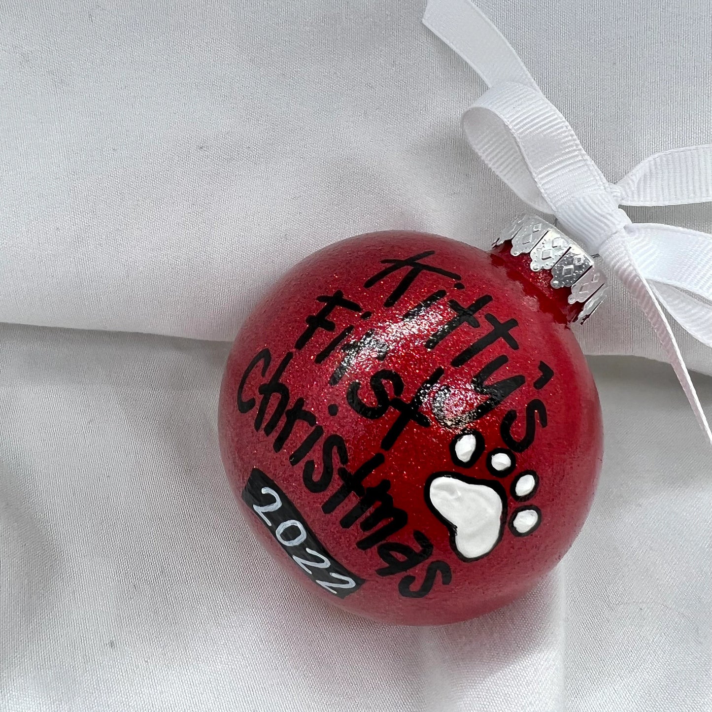 Pawsitively Adorable: Kitty's First Christmas Ornament!