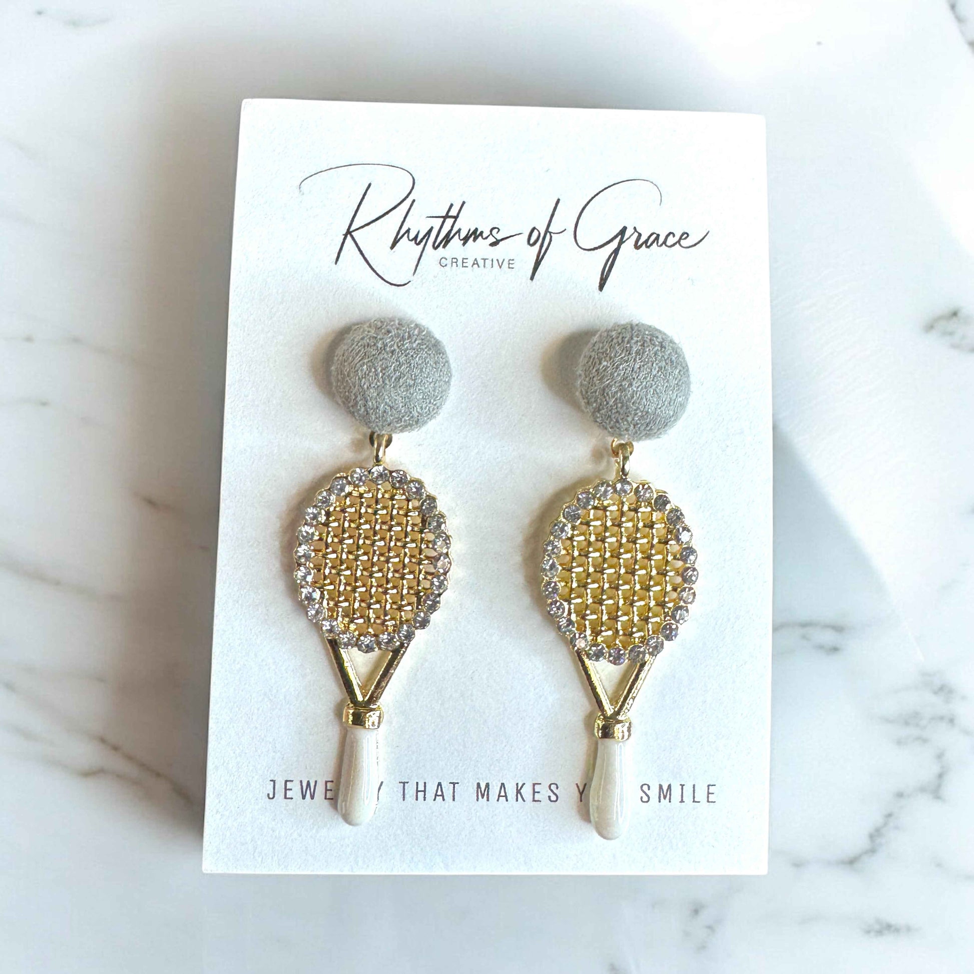 Sparkle on the Court with Our Rhinestone Tennis Racket Dangle Earrings! 🎾