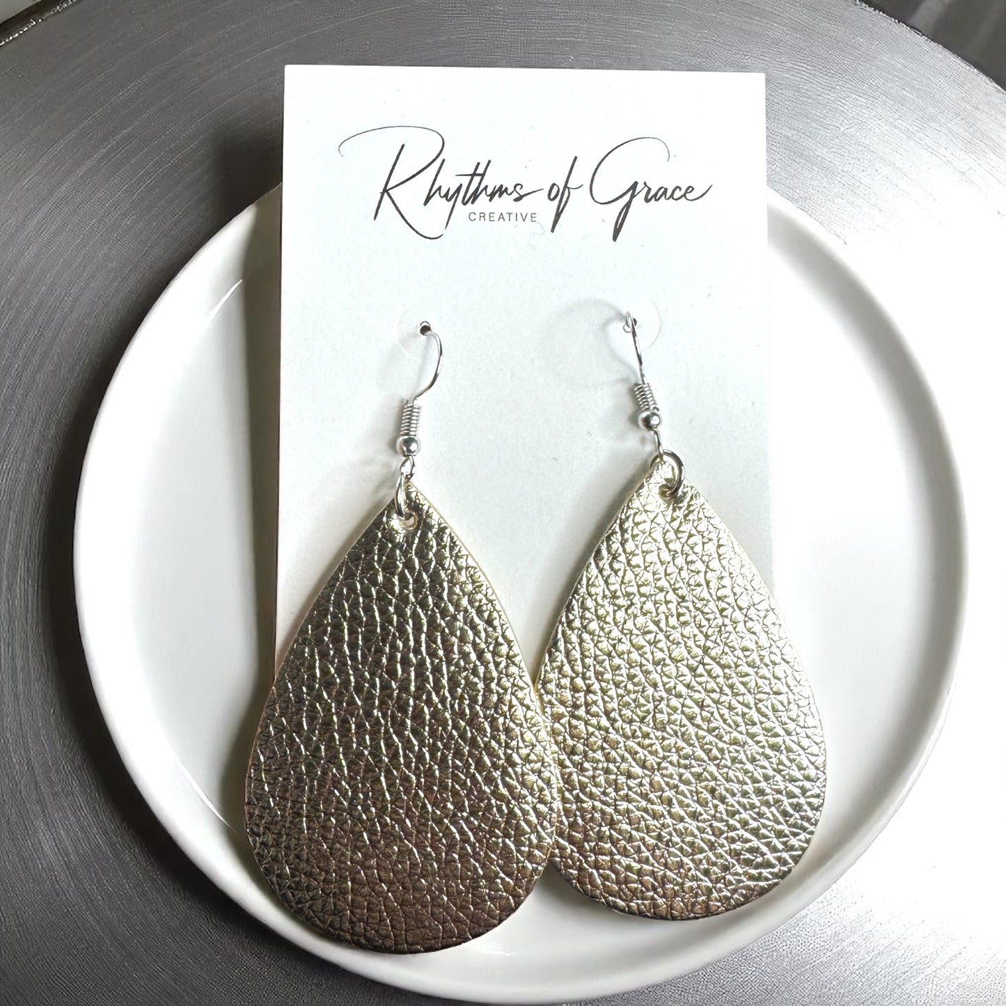 Sparkle & Shine: Metallic Teardrop Faux Leather Earrings! 🌟