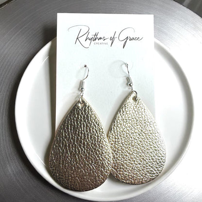 Sparkle & Shine: Metallic Teardrop Faux Leather Earrings! 🌟