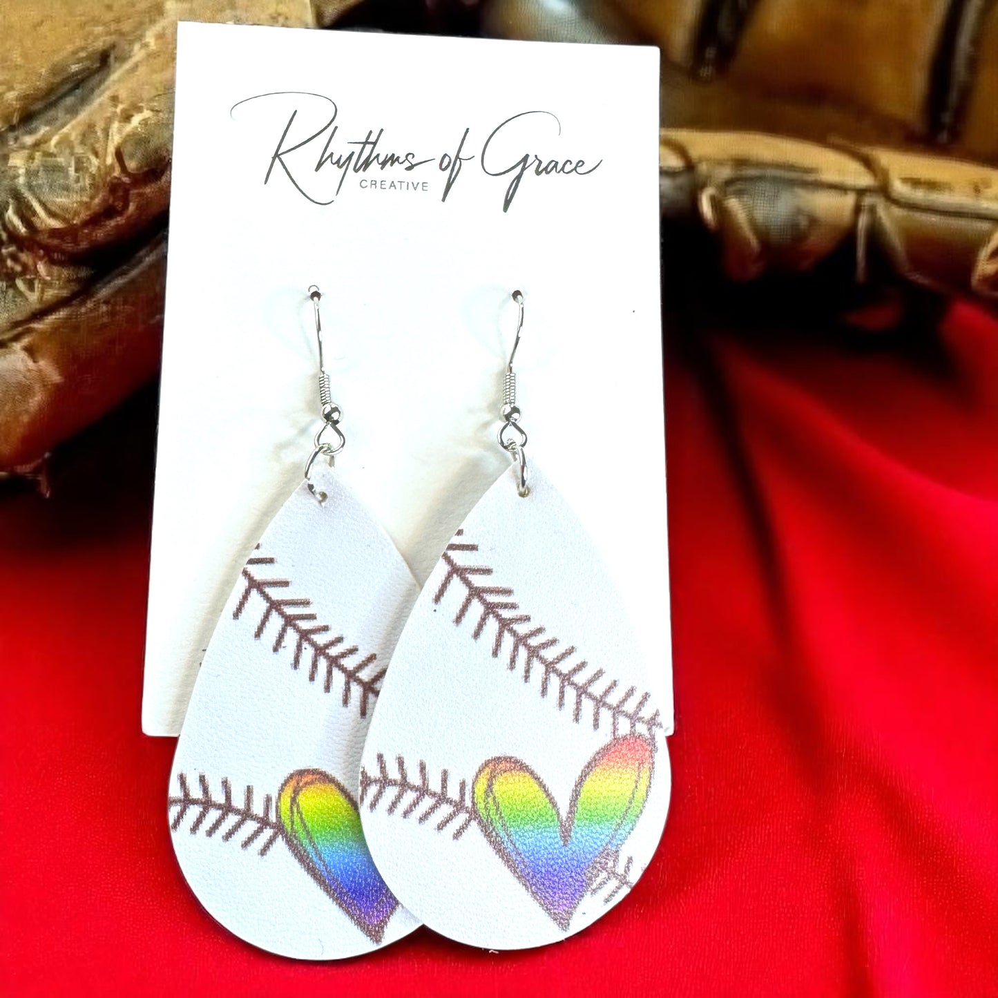 Swing into Style with Our Rainbow Heart Baseball Dangle Earrings! ⚾️🏳️‍🌈
