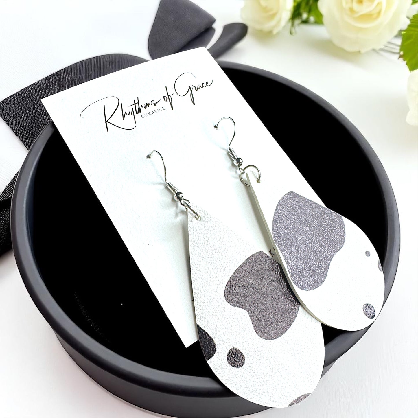 Stylishly Chic Cow Print Teardrop Earrings – Perfect for Everyday