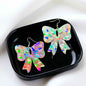 Sparkle & Spook: Holographic Bow Earrings for a Stunning Glam!