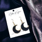 Shimmering Nights: Black Stone Earrings with Golden Glam!
